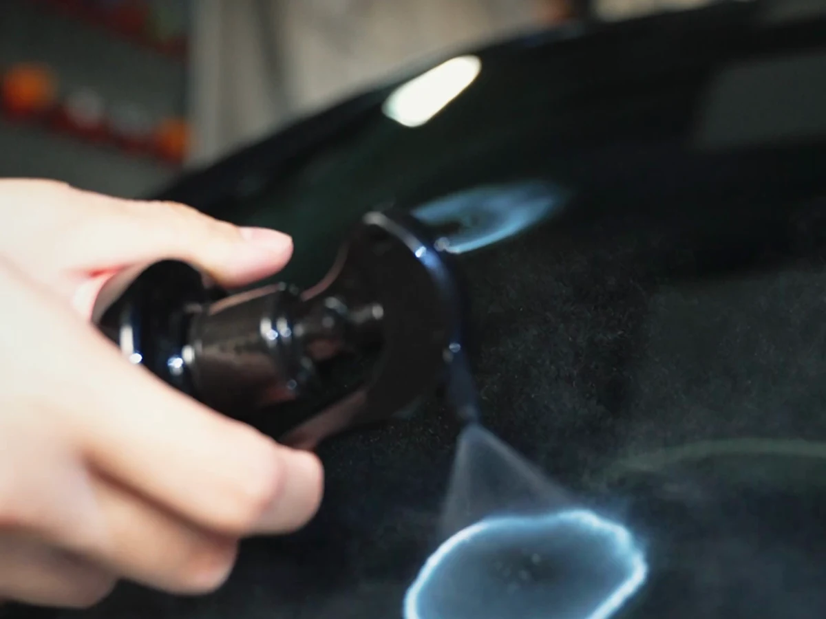 D204 being sprayed on clean, fully dry automotive paint